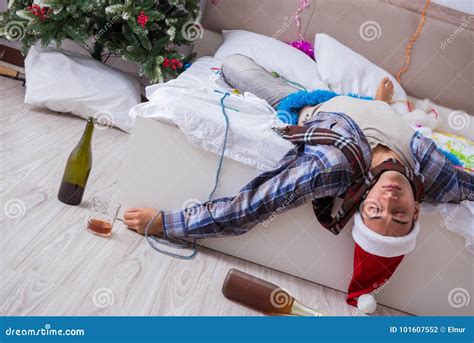 The Man Suffering Hangover After Christmas Party Stock Photo Image Of Mess Drink