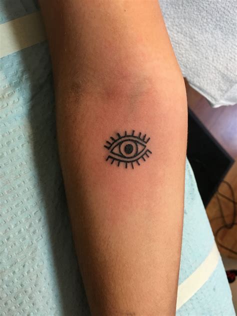 evil eye tattoo small virgie satterfield