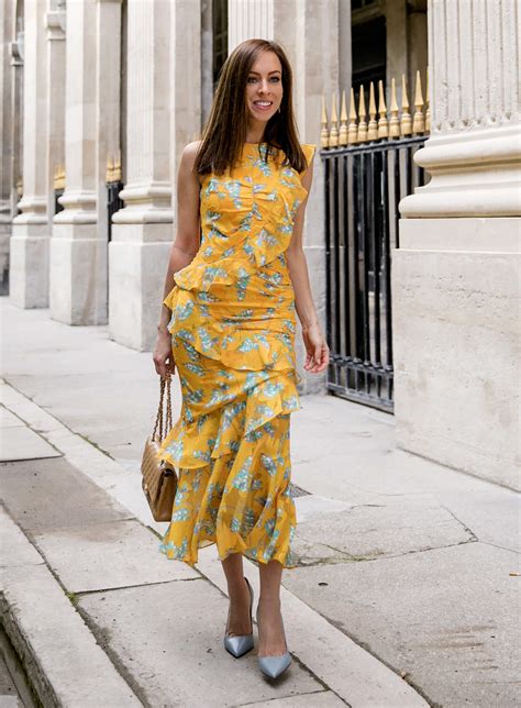 Sydne Style Wears Three Floor Yellow Floral Dress For Paris Street