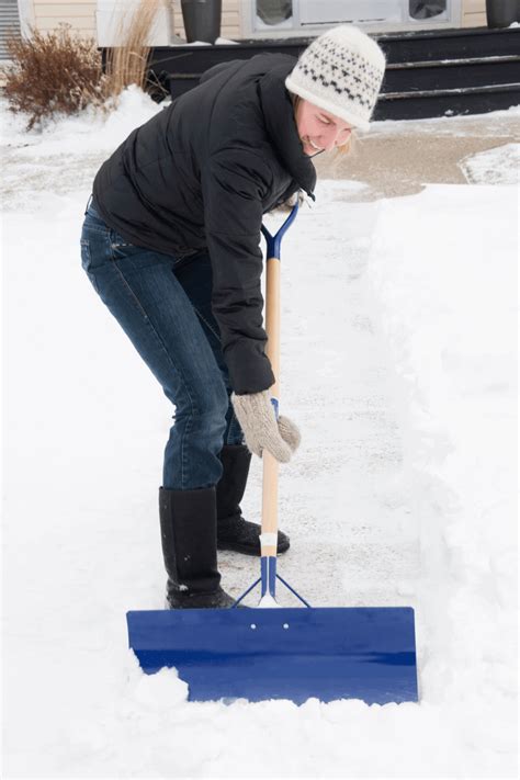 How To Shovel Snow Safely This Winter Experigreen
