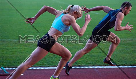 Woman Group Running On Athletics Race Track From Start 4278 Meashots