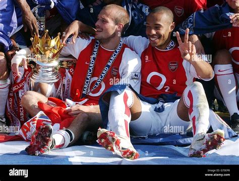 Arsenal Players Fredrik Ljunberg And Thierry Henry Celebrate With The