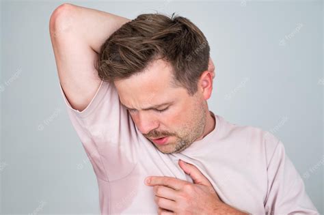 Premium Photo Man With Hyperhidrosis Sweating Very Badly Under Armpit