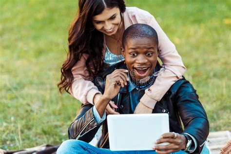 Happy Interracial Couple Taking Selfie With Tablet At The Stock Image Image Of People
