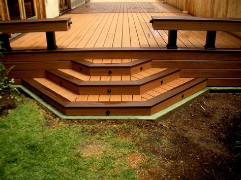 Trex fascia utilized around the perimeter of a deck must be gapped with the how to install decking. Trex deck with custom steps and green concrete curb to ...