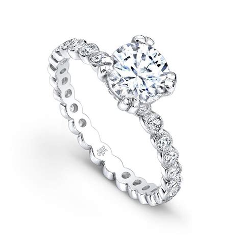 Elegantly Crafted This Beautiful 18k White Gold Bridal Ring Features Round Bezel Set Diamonds