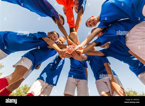 Kids Soccer Team In Huddle Stock Photo Alamy