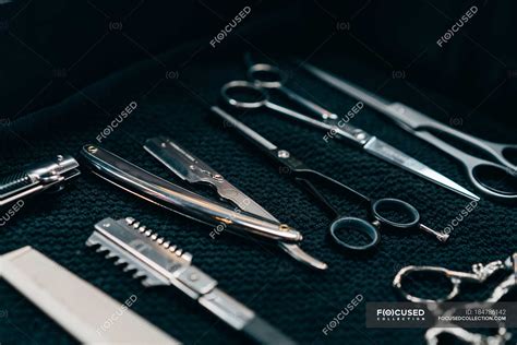 Set Of Scissors And Combs — Various Top View Stock Photo 184786142