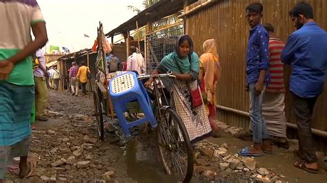 Parliamentarians See Impact Of Aid In Dhaka Slums Sbs News