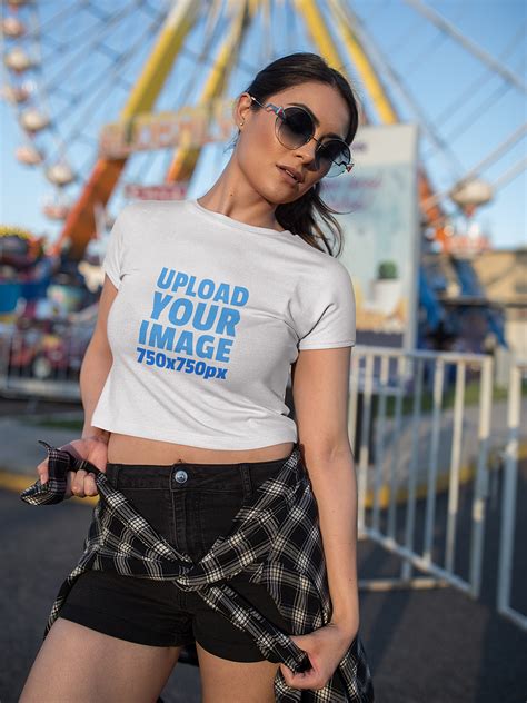 That's why it's also important to show your work on actual, posing models. Woman Wearing a Crop Top T-Shirt Mockup at an Amusement ...