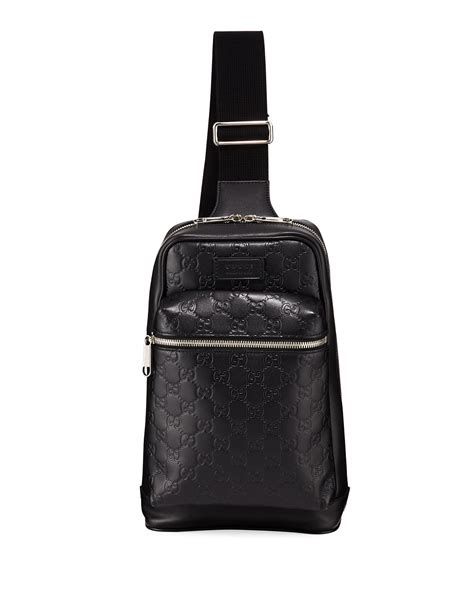 Bags play an integral part in every woman's life. Gucci Men's GG Leather Crossbody Backpack | Neiman Marcus