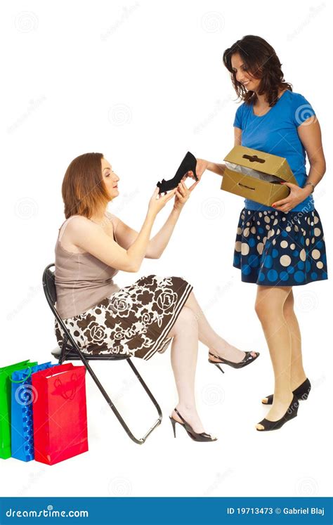 Smiling Clerk Showing New Shoe To Woman Stock Image Image Of Feet Length 19713473