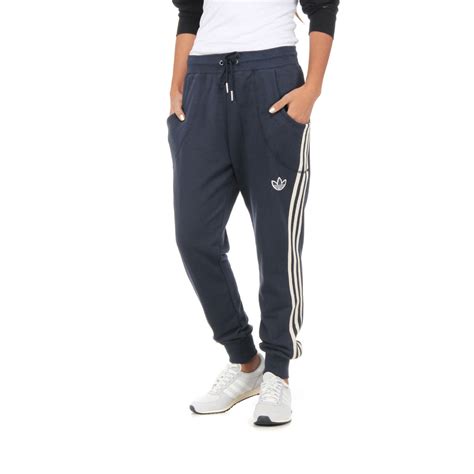 Stay in style with adidas track pants. adidas - College Women Track Pants (Dark Navy) | HHV