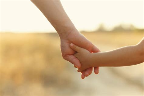 50200 Parent Child Holding Hands Stock Photos Pictures And Royalty