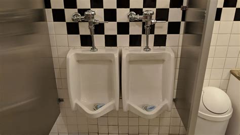 Two Urinals But Only One Usable At A Time Unless You Want To Get Very