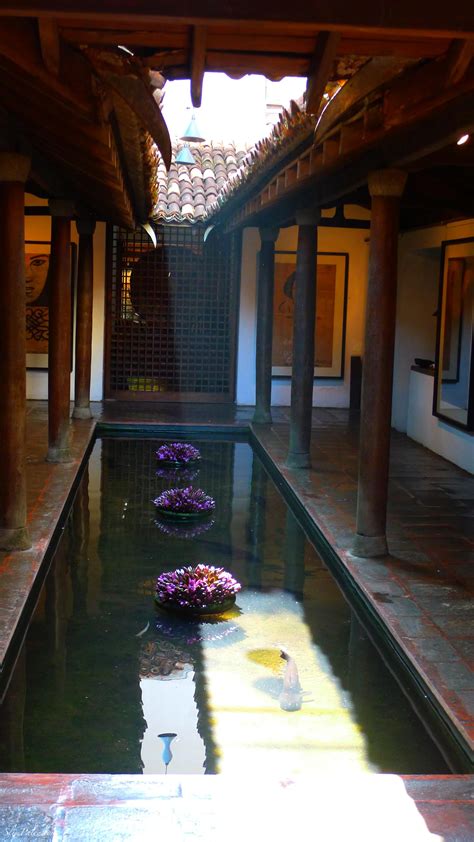 The Courtyard Features A Pond Of Giant Black Koi Fish Fabulously
