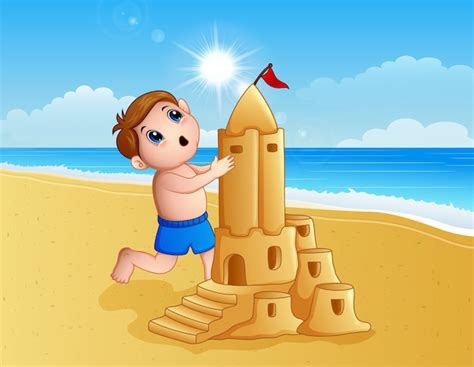 Niño haciendo un gran castillo de arena en la playa Descargar