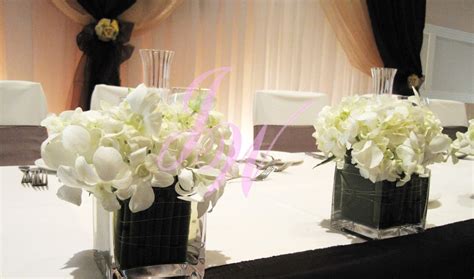 When it comes to wedding centerpieces, no matter the season, shade, or style, sometimes you have to do less to you know how we feel about petite bouquets, so why not consider a petite arrangement to go along with it? Joyce Wedding Services: #Orchid Head Table #Centerpieces
