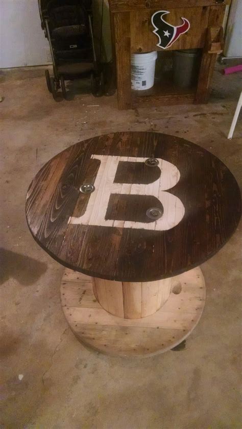 Multi coloured old boat wood style spool coastal coffee table 61 cm x 61 cm diameter 3 sleek silver grey metal hairpin legs made to order. Wire spool table … | Spool furniture, Spool tables, Wooden ...