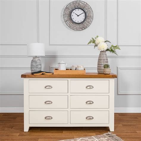 Beds, dressers, armoires and nightstands are the necessities that make up typical bedroom furniture sets, and while it certainly can be convenient. Hampshire Ivory Painted Oak 6 Drawer Chest | Bedroom chest ...