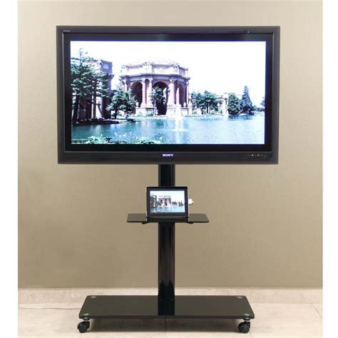 How to mount a tv to a stand. TransDeco 65 in. TV Stand with Attached Mounting System ...