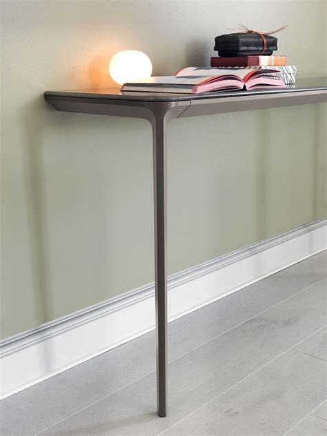 Or place it in your living room, styled with books, blankets and special mementos. Slim Console Tables That Will Add the Sophistication of Your Living Room Ideas - HomesFeed