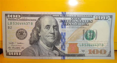 New 100 Bill Unveiled At Federal Reserve Bank Houston