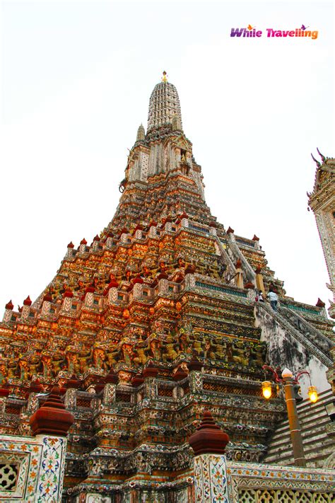 The Sunset At Wat Arun Temple Of Dawn While Travelling