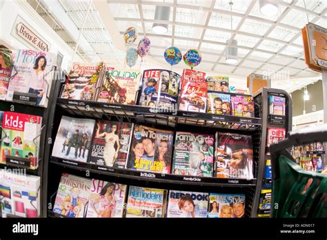 Magazine Rack At Check Out Counter Of Large American Supermarket Stock