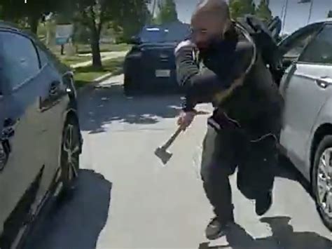 Shocking Video Shows Cop Fatally Shooting Hatchet Wielding Assailant