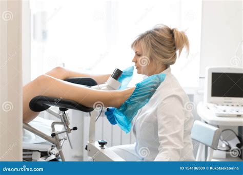 A Gynecologist Examines A Patient On A Gynecological Chair Workflow Of A Gynecologist Stock