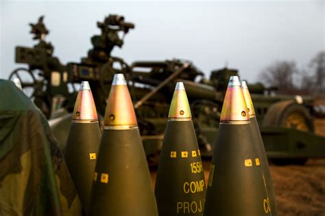 M795 High Explosive Projectile 155 Mm Rounds Are Prepped And Staged To
