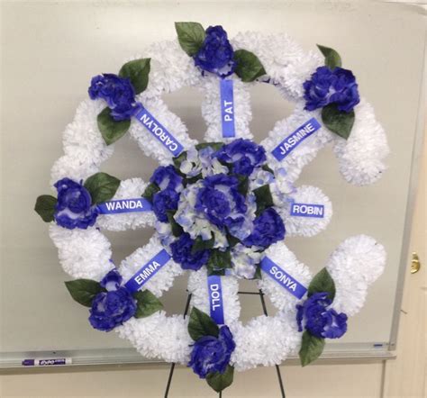 All you have to do is to speak to us and explain your situation. Family wagon wheel | Funeral flowers, Sympathy flowers ...