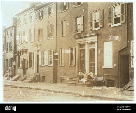 Group Of Children Playing On The Stoop Of A House Next To 229 Tatnall