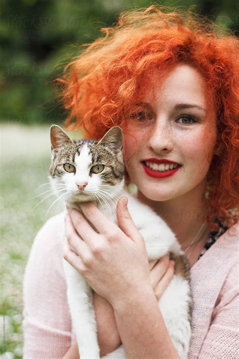 Beautiful Ginger Woman Holding A Cat By Stocksy Contributor Jovana Rikalo Stocksy