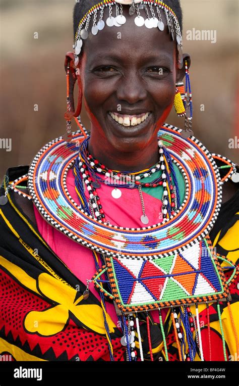 Maasai Women Dressed In Traditional Costumes In Their Village Stock