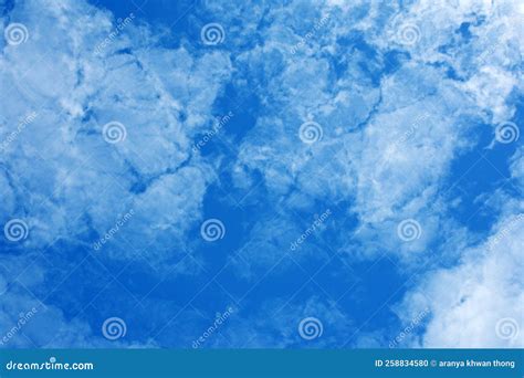 Blue Sky Scenery With White Fluffy Clouds For The Background Stock