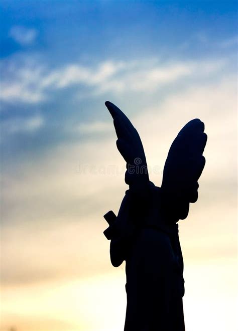 Silhouette Of A Stone Angel At Sunset Stock Photo Image Of Outdoor