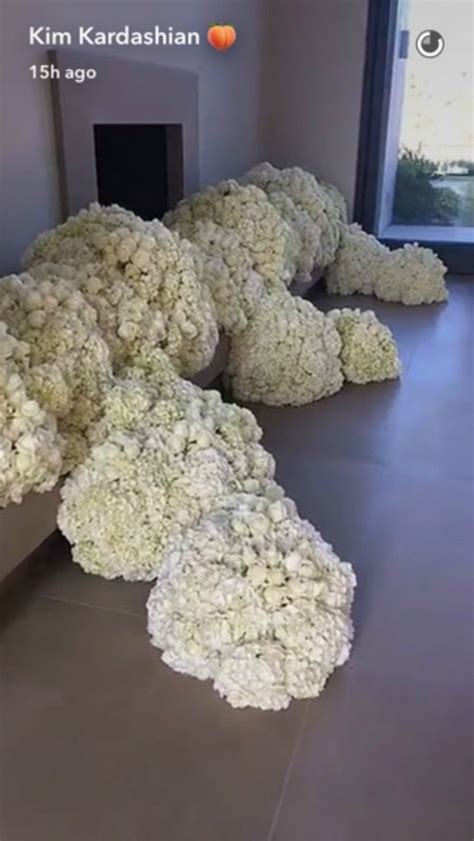 Delicate lace sleeves are buttoned to perfection and a beaded belt adds a touch of sparkle. Kanye West Surprises Kim Kardashian With Bouquets of ...