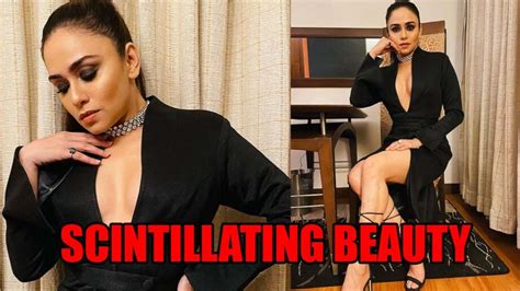 scintillating beauty amruta khanvilkar flaunts her gorgeously stunning body in black dress with
