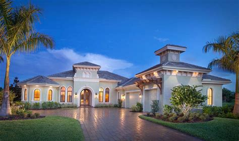 These plans have gained popularity as family homes. 4-Bedroom Home with Red Brick Driveway & 3-Car Garage (1 ...