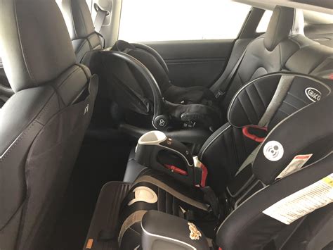 After 40lbs, the seat supports children in the forward facing position up to 65lbs. Model 3 with a forward facing and rear facing car seats ...