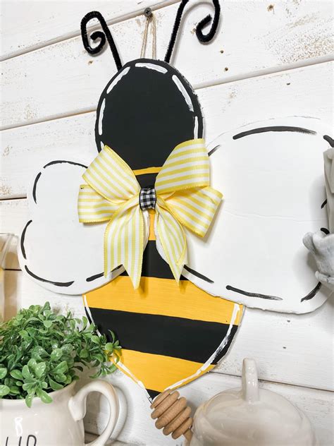Bumble bees are social insects that tend to form colonies of their own. Get Your Free Bumble Bee Door Hanger Template