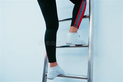 Sporty Woman Climbing The Ladder Stock Photo Image Of Climbing Black