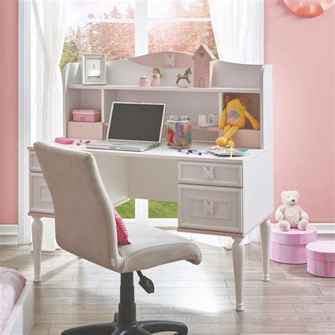 Compact and lightweight plastic children's desks often feature a chunky frame with seat and desk attached together. White Desk For Teenage Girl Study Time In Bedroom