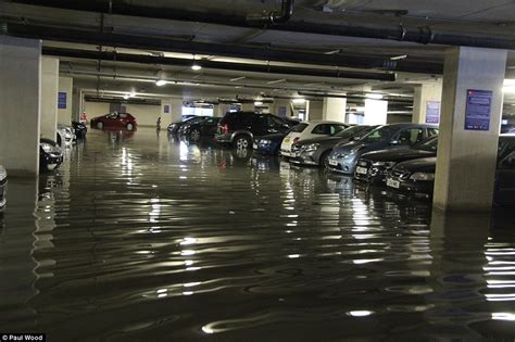 Valet at mid valley megamall & the gardens mall. Vehicles are CRUSHED against the roof as a burst water ...