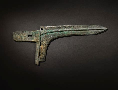 An Exceptionally Rare And Important Archaic Bronze Ceremonial Halberd