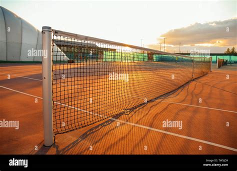 Beautiful Tennis Court At Sunset Stock Photo Alamy