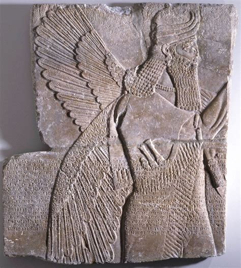 Assyrian Inscribed Relief Of A Winged Genius From The Palace Of