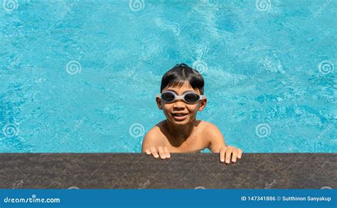 Boy Happy Swimming In A Pool Beautiful Little Boy Swimming At The Pool
